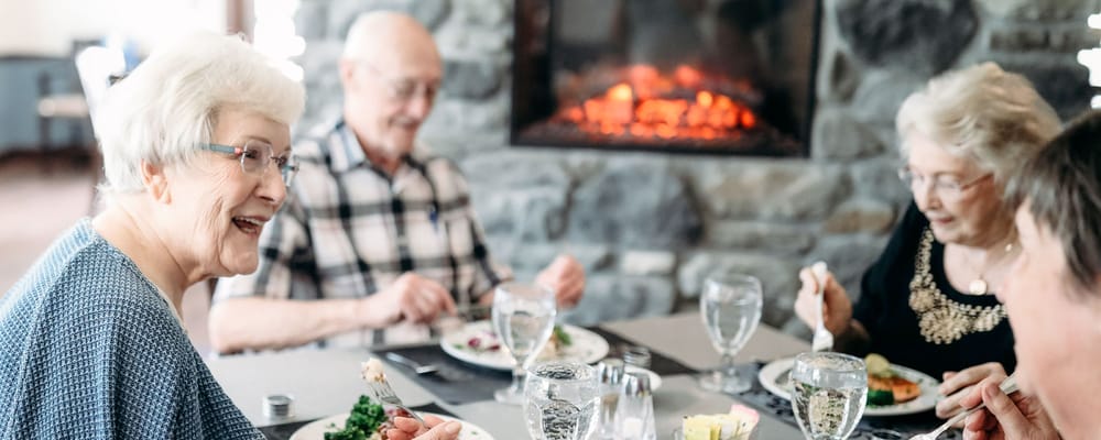 Residents enjoying a meal in the dining room