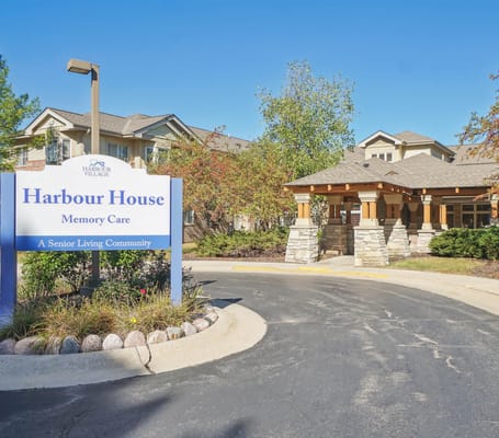 Entrance sign for Harbour Village senior living community