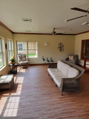 Bright common area with seating and decorations