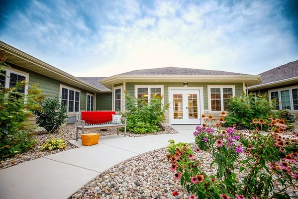 Beautiful outdoor courtyard with flowers and seating