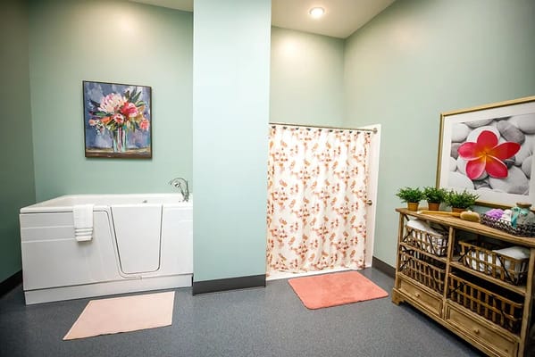 Interior view of a bathroom with a walk-in tub