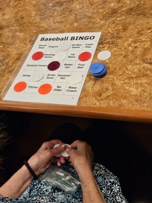 Residents playing Baseball Bingo.