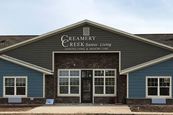 Exterior view of Creamery Creek Senior Living building