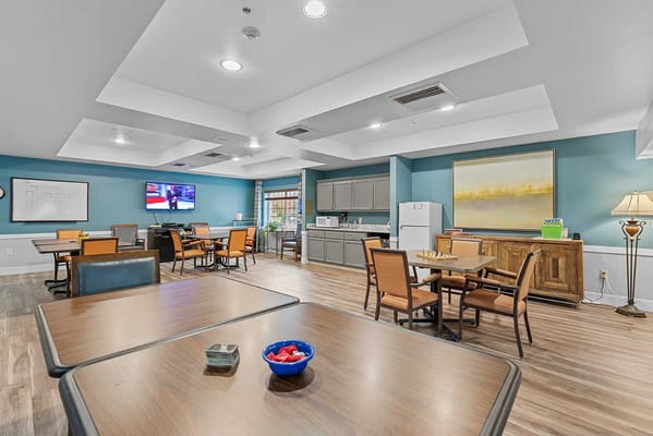 Common area with seating and activity tables