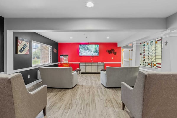 Common area with seating and television