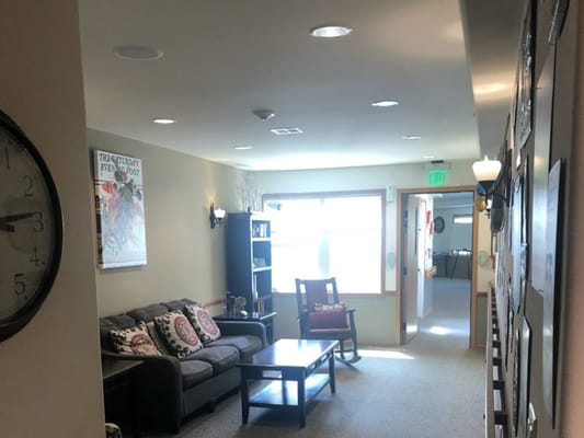 Interior view of a cozy common area with seating