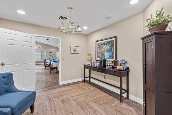 Interior view of a cozy common area with seating.