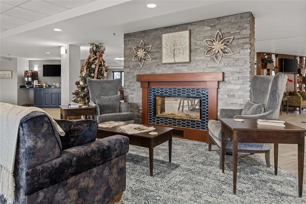 Interior common area with seating and fireplace