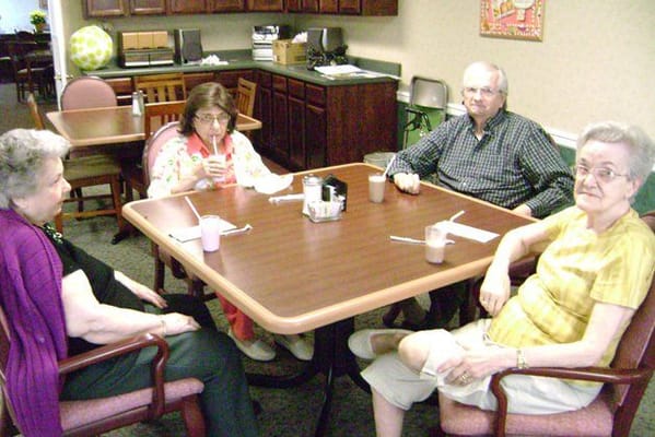 Residents enjoying conversation in a common area
