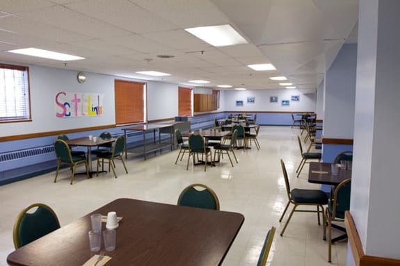Dining area with tables and chairs set up