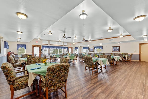Dining room with tables and floral decor