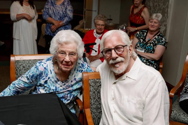 Residents enjoying a social event with smiles