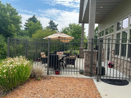 Outdoor patio with seating and umbrellas