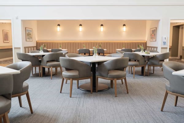 Bright dining room with modern furniture and decor