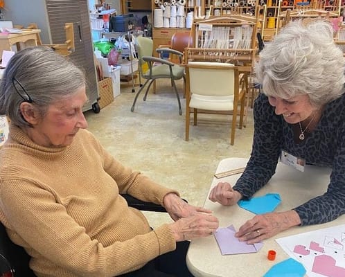 Residents participating in an engaging activity together