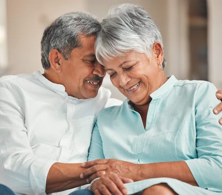 A senior couple enjoying a moment together indoors