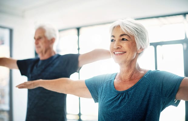 Residents participating in an exercise activity indoors