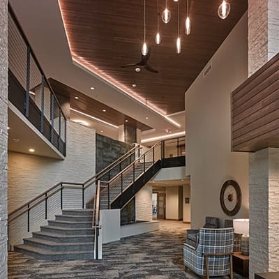 Interior view of a modern lobby with staircase