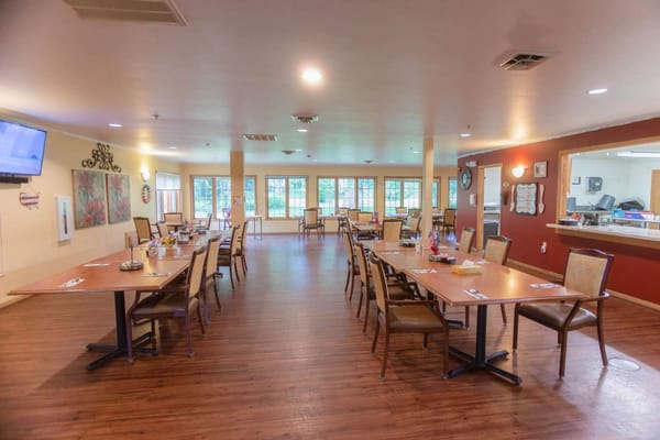 Dining area with tables set for meals