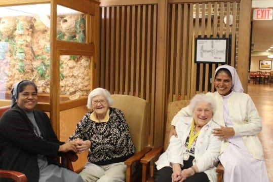 Residents enjoying time together in a common area