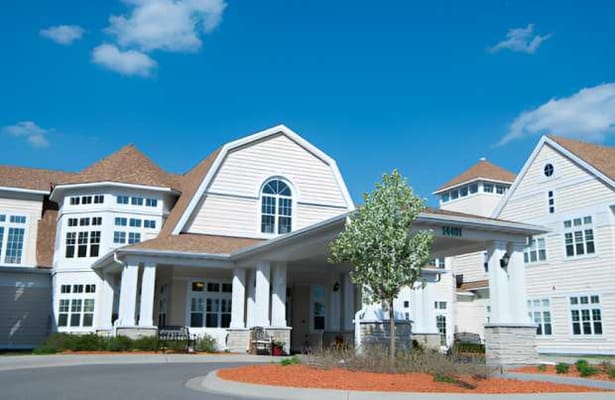 Outdoor view of Stoney River Memory Care building entrance