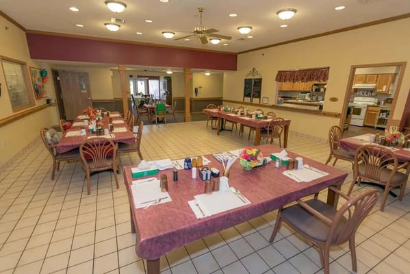 Clean dining room setup with tables and chairs