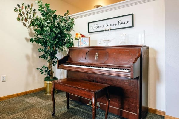 A piano in a welcoming common area