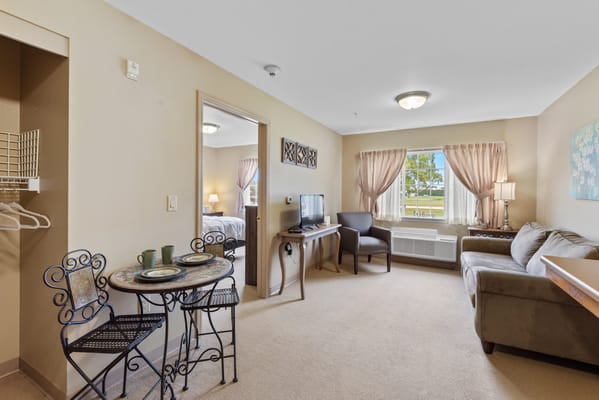 Cozy interior of a resident room with seating area