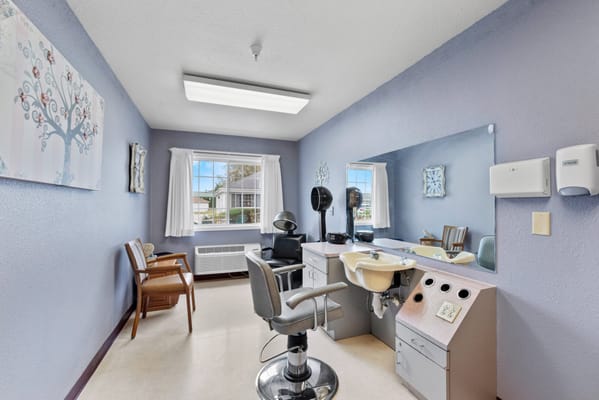 Hair salon area with styling tools and chairs