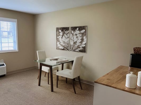Cozy dining area with table and chairs
