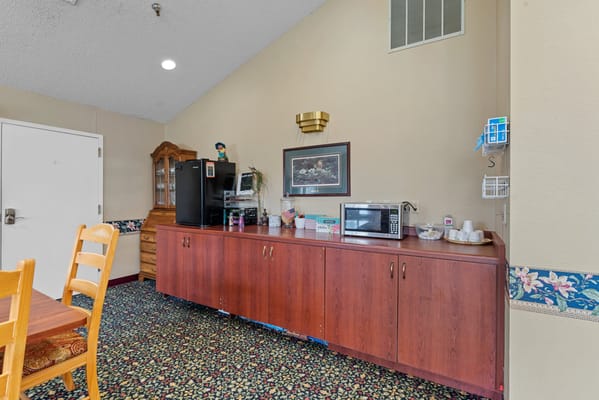 Common area with a kitchenette in a senior facility