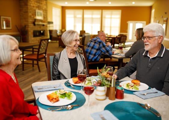 Residents dining and enjoying a meal together