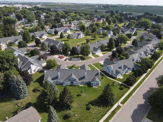 Aerial view of a senior living community with homes