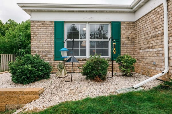 Outdoor space featuring shrubs and decorations