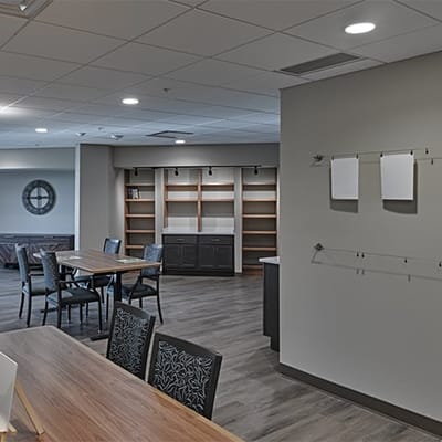 Interior view of a common area with tables and chairs