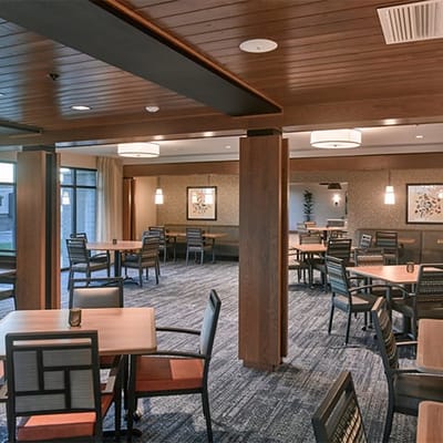 Bright dining room with tables and chairs