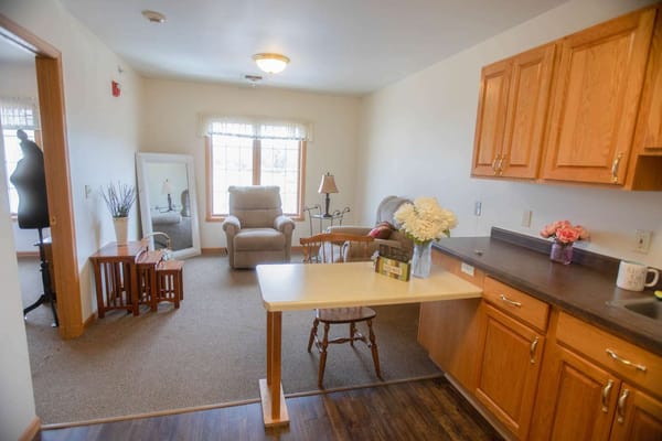 Cozy interior of a resident room with furniture