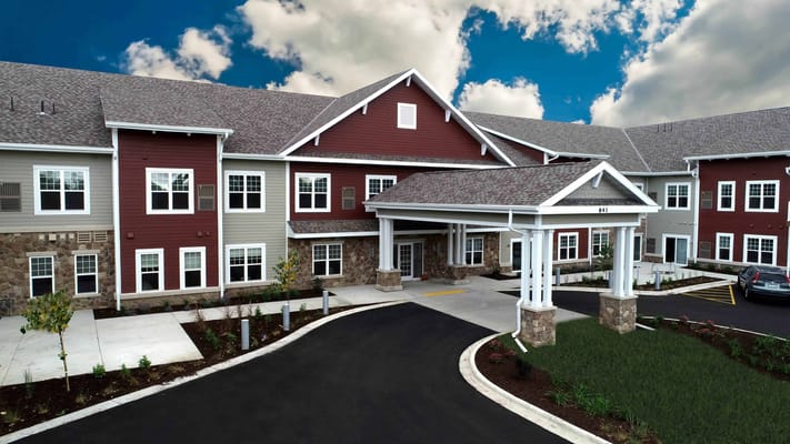 Exterior view of Attic Angel Place with entry and landscaping