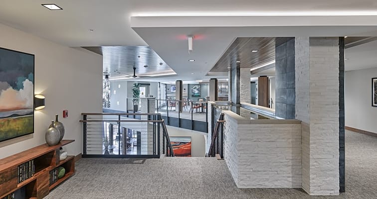 Interior view of a spacious common area in a senior living facility