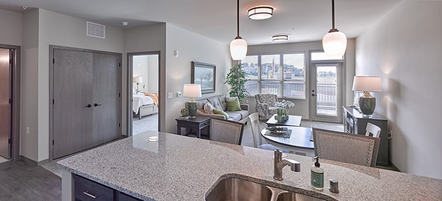 Bright and modern living room in a resident suite