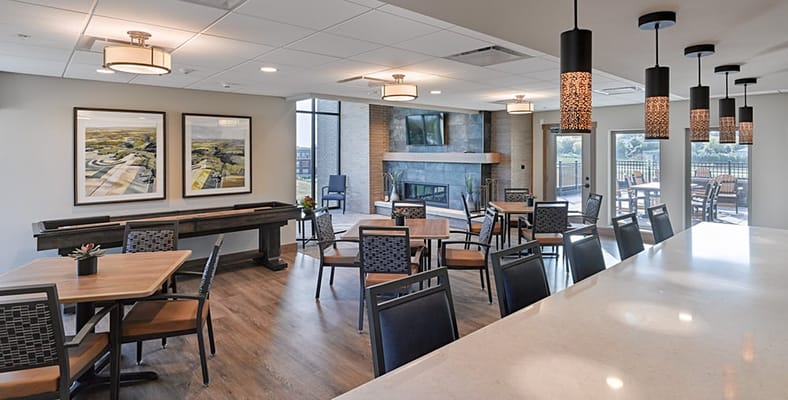 Interior common area with tables and chairs