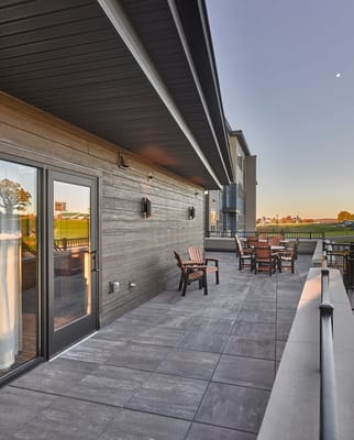Outdoor patio area with seating and views