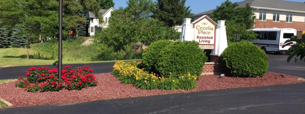 Sign and landscaping at the entrance of Cecelia Place