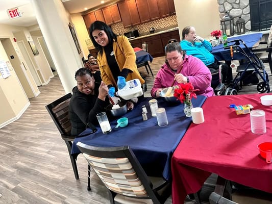 Residents engaging in an activity during a social event