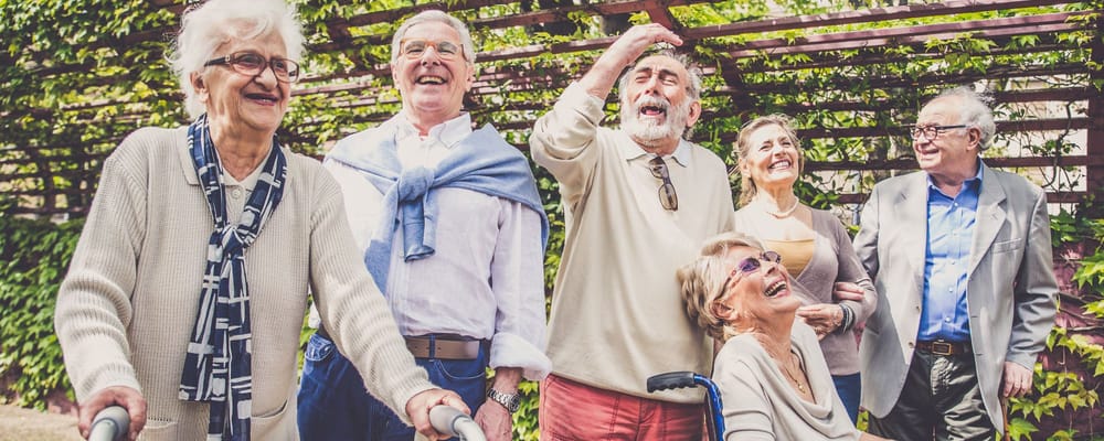 Residents enjoying laughter in an outdoor space
