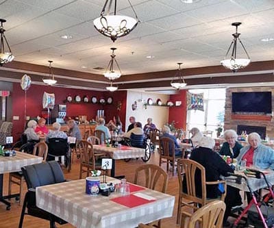 Residents enjoying lunch in the dining room