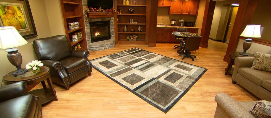 Cozy lounge area with a fireplace and comfortable seating