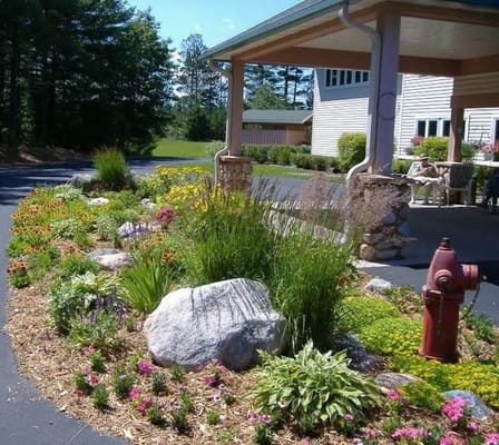 Beautifully landscaped outdoor space with flowers and greenery