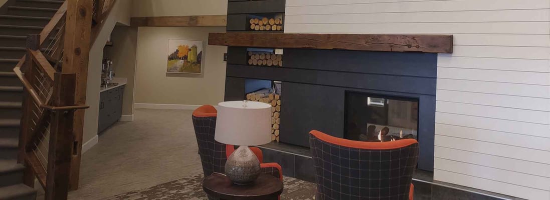 Cozy common area with seating and fireplace