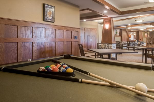 Billiard table set up in a common area